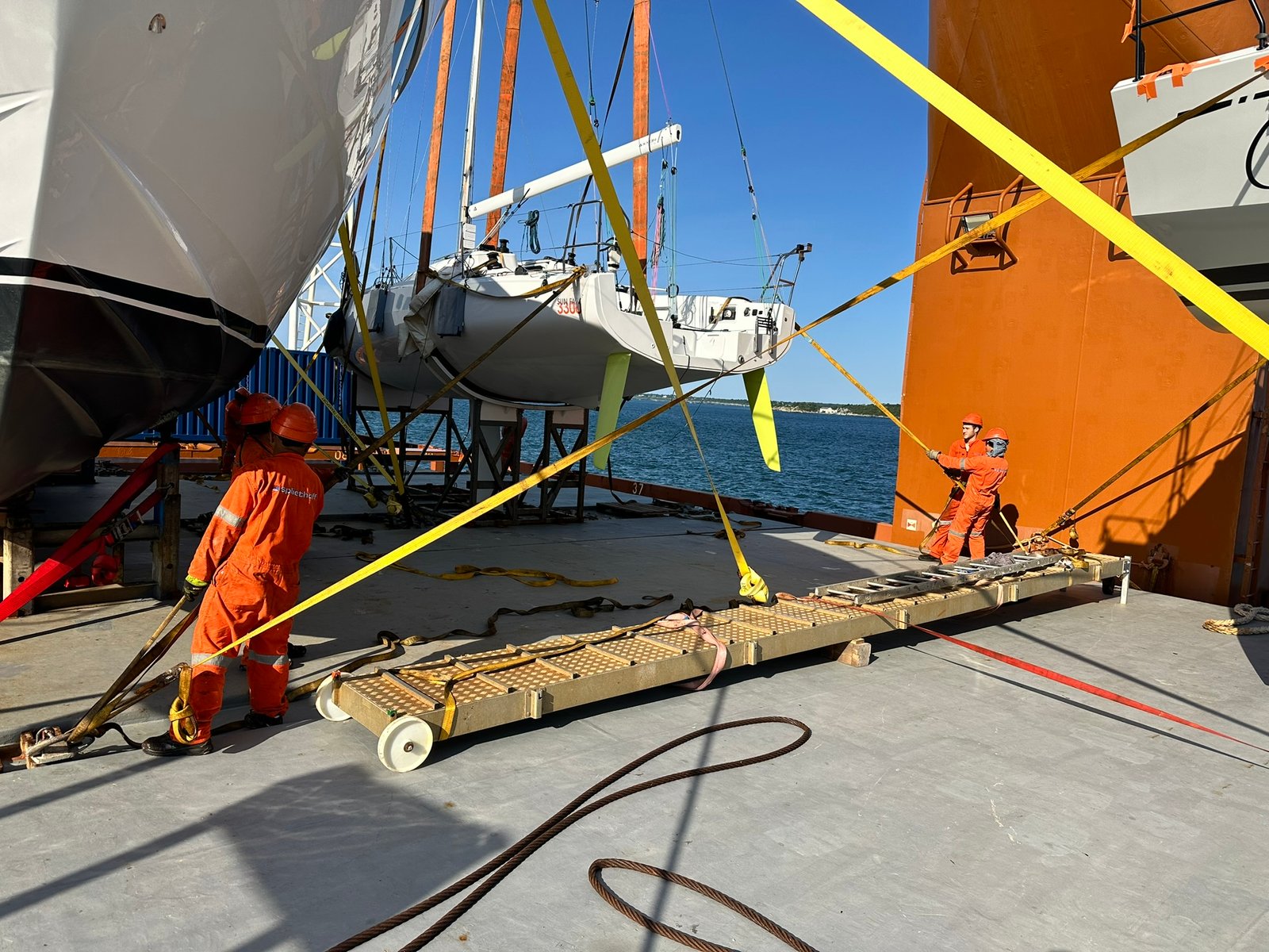 Sevenstar crew guides Stratos off the ship