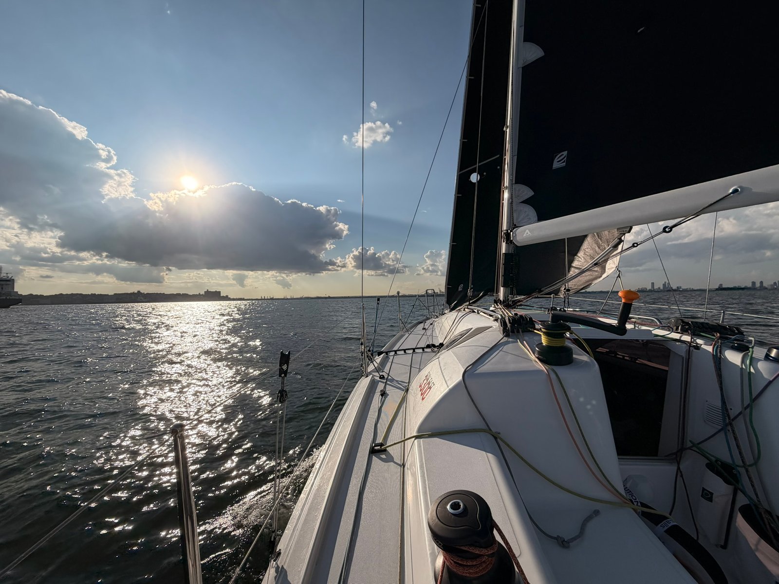 Late afternoon light on the water — Stratos foredeck